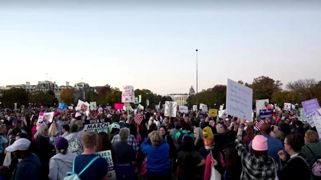 Thousands rally for women's rights in Washington ahead of presidential election