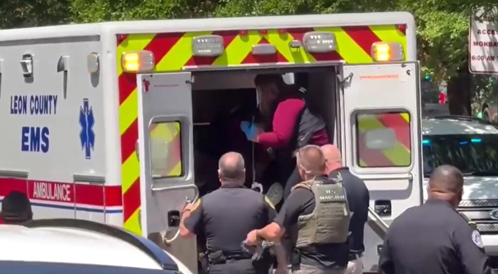injured victim in ambulance after mass shooting in Florida State University