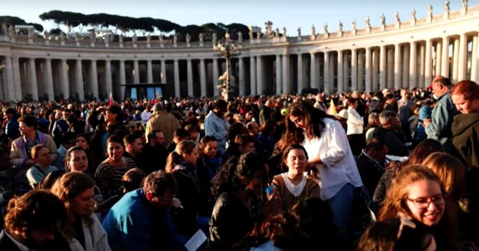 crowds queuing to enter St Peter's Square for papal funeral