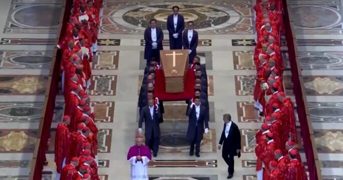 Pope Francis' coffin being carried towards door in St. Peter's Basilica