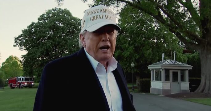 Trump wearing white hat