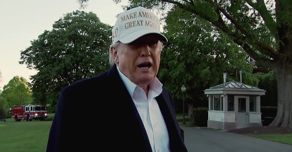 Trump wearing white hat