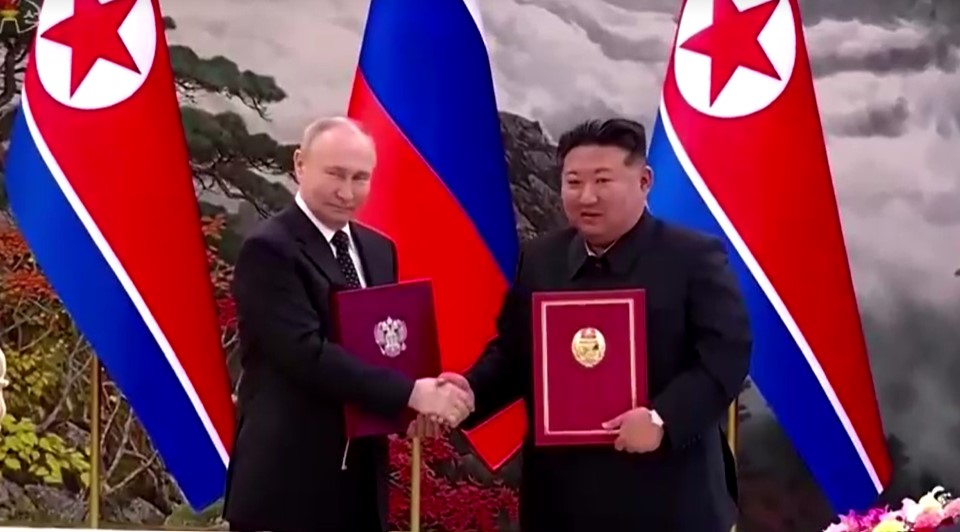 Kim Jong-un shaking hands with Vladimir Putin after signing a mutual defense treaty in June 2024 in Pyongyang
