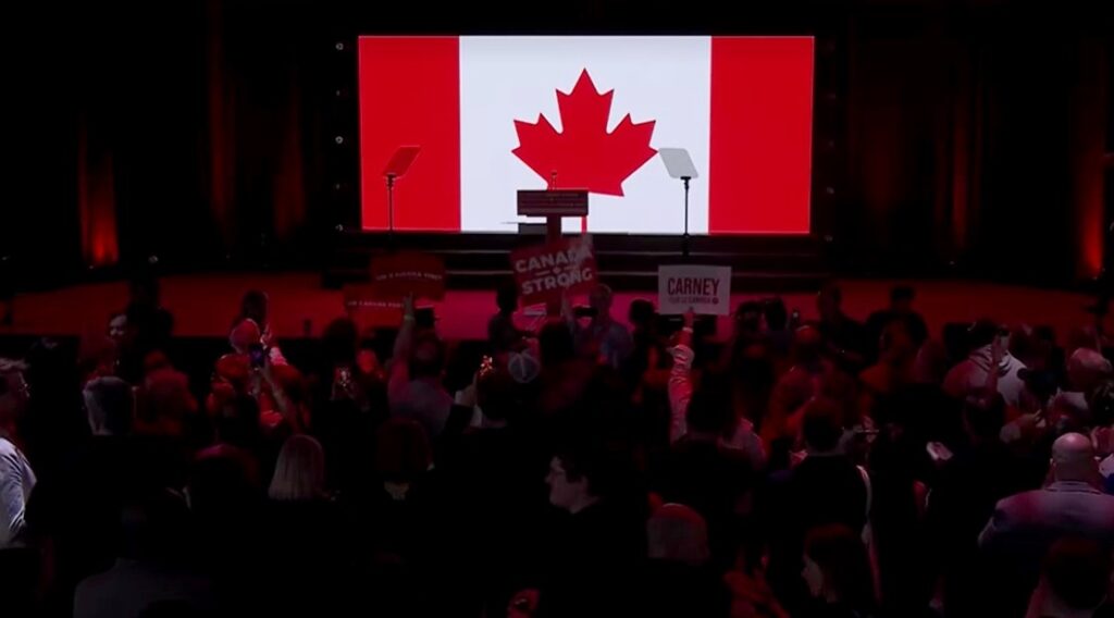 Liberal Party's supporters cheer as Canadian media projects victory
