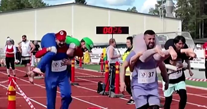 participants in Wife Carrying World Championships in Finland
